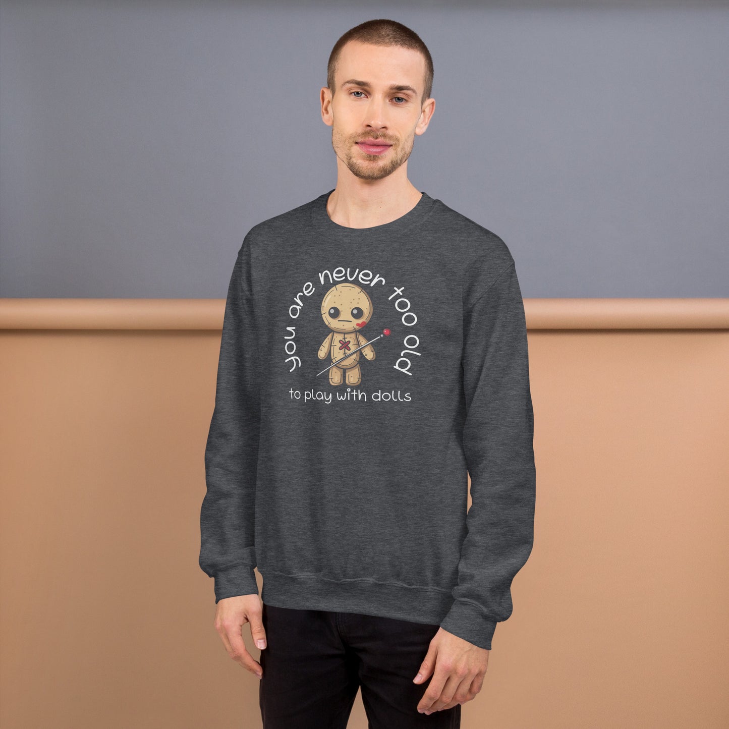Voodoo Doll Quote: "You are never too old to play with dolls" Unisex Sweatshirt