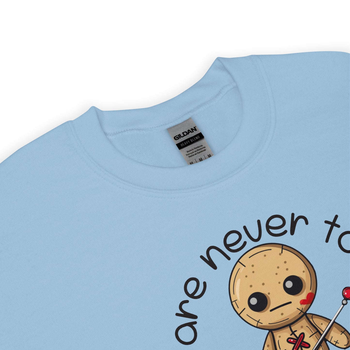 Voodoo Doll Quote: "You are never too old to play with dolls" Unisex Sweatshirt