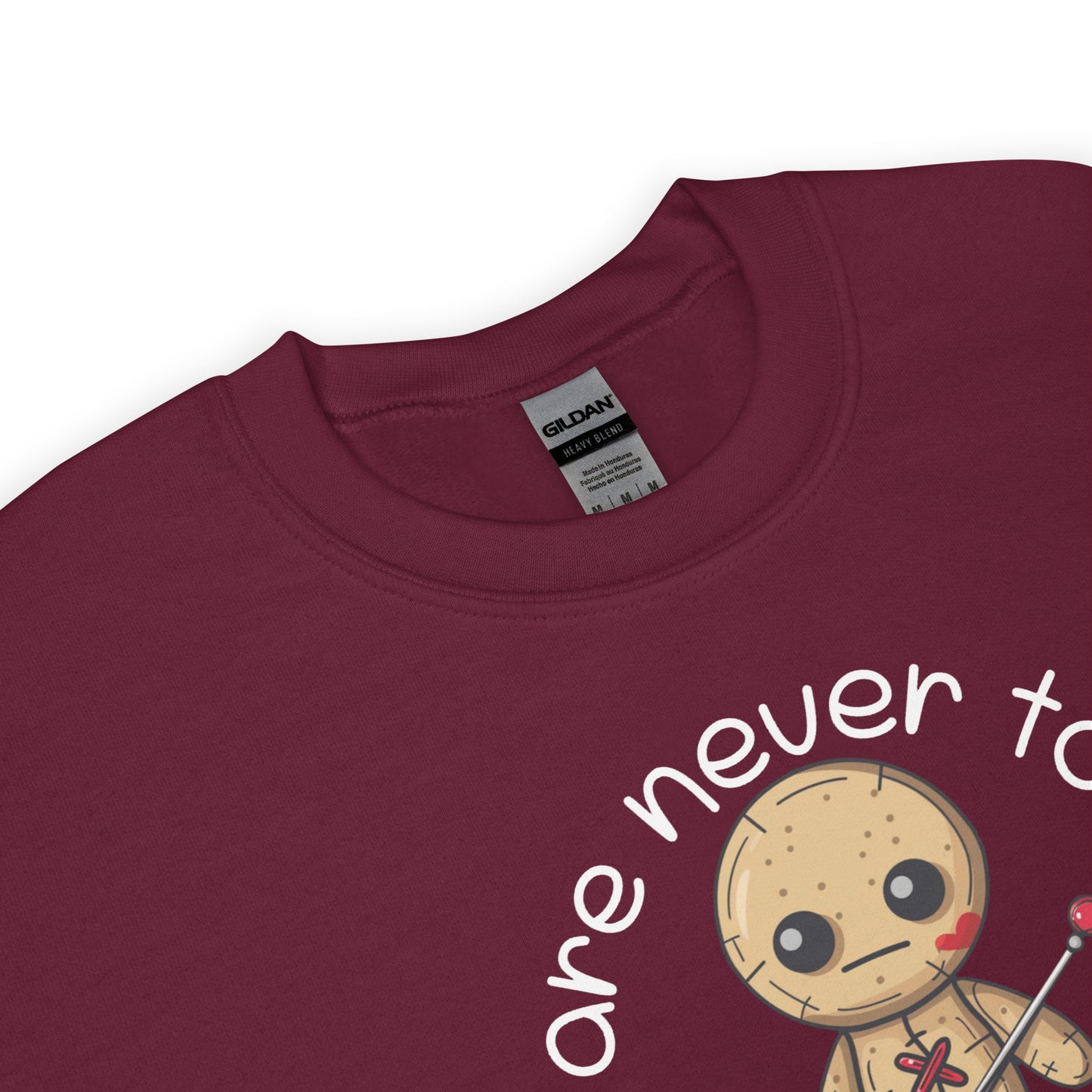 Voodoo Doll Quote: "You are never too old to play with dolls" Unisex Sweatshirt