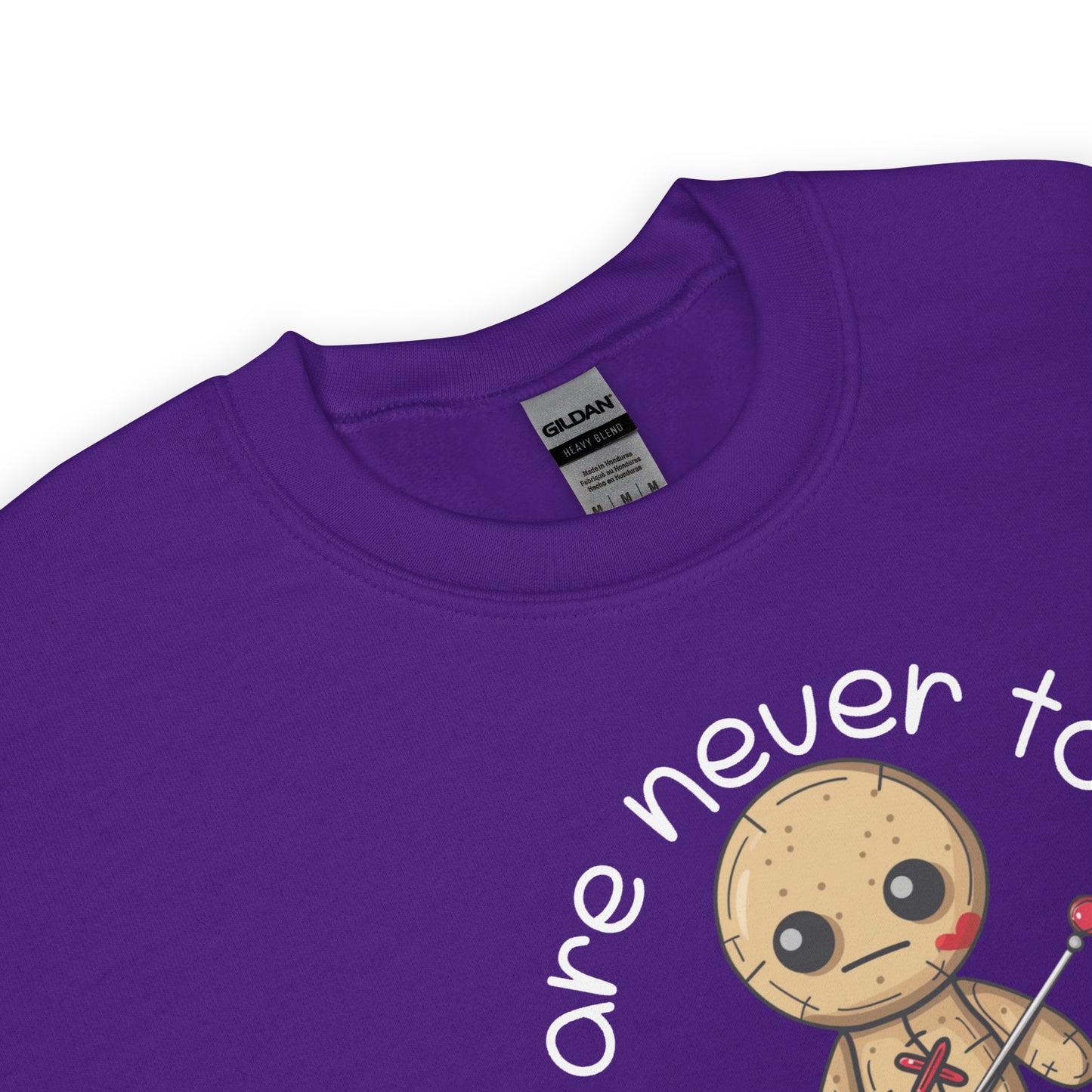Voodoo Doll Quote: "You are never too old to play with dolls" Unisex Sweatshirt