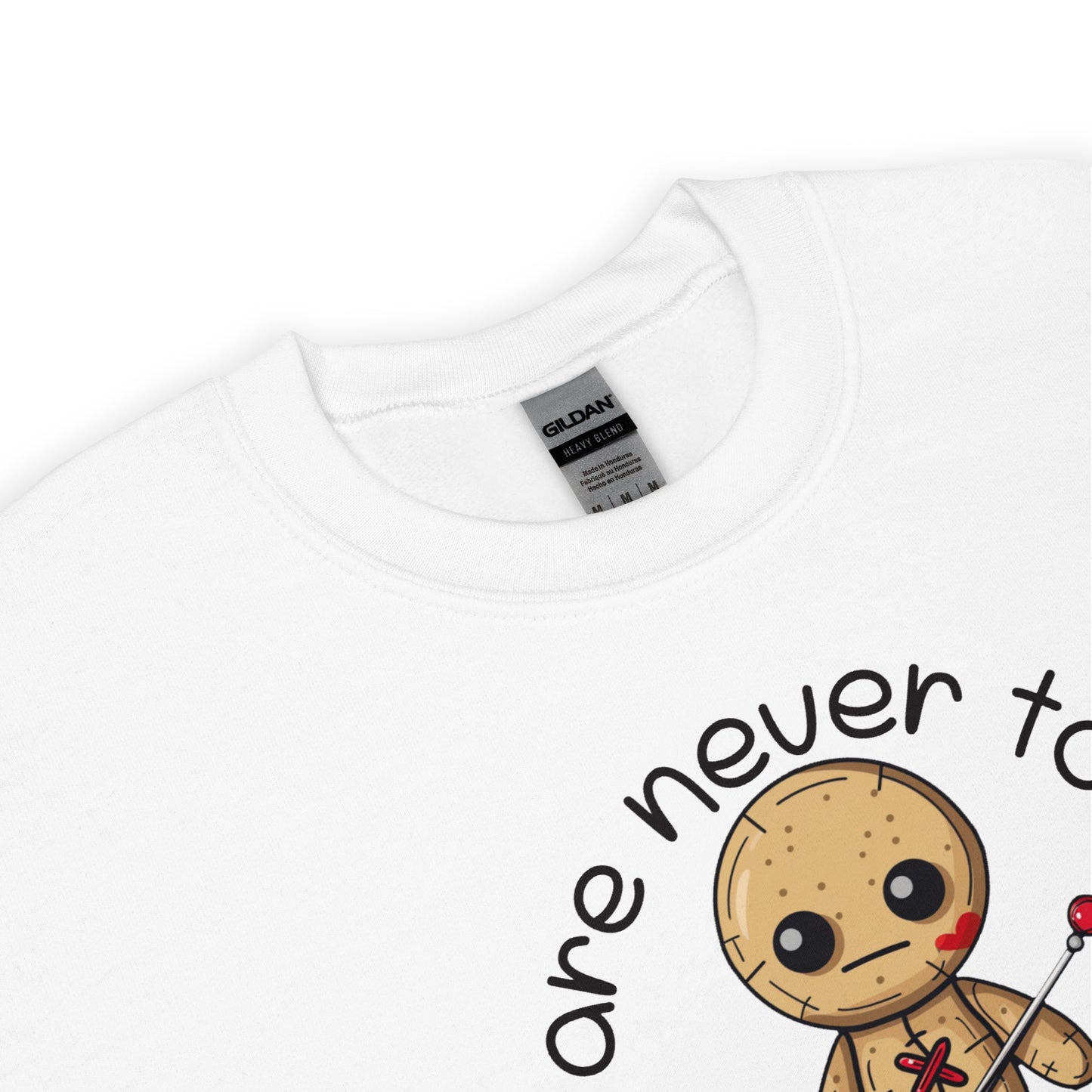 Voodoo Doll Quote: "You are never too old to play with dolls" Unisex Sweatshirt